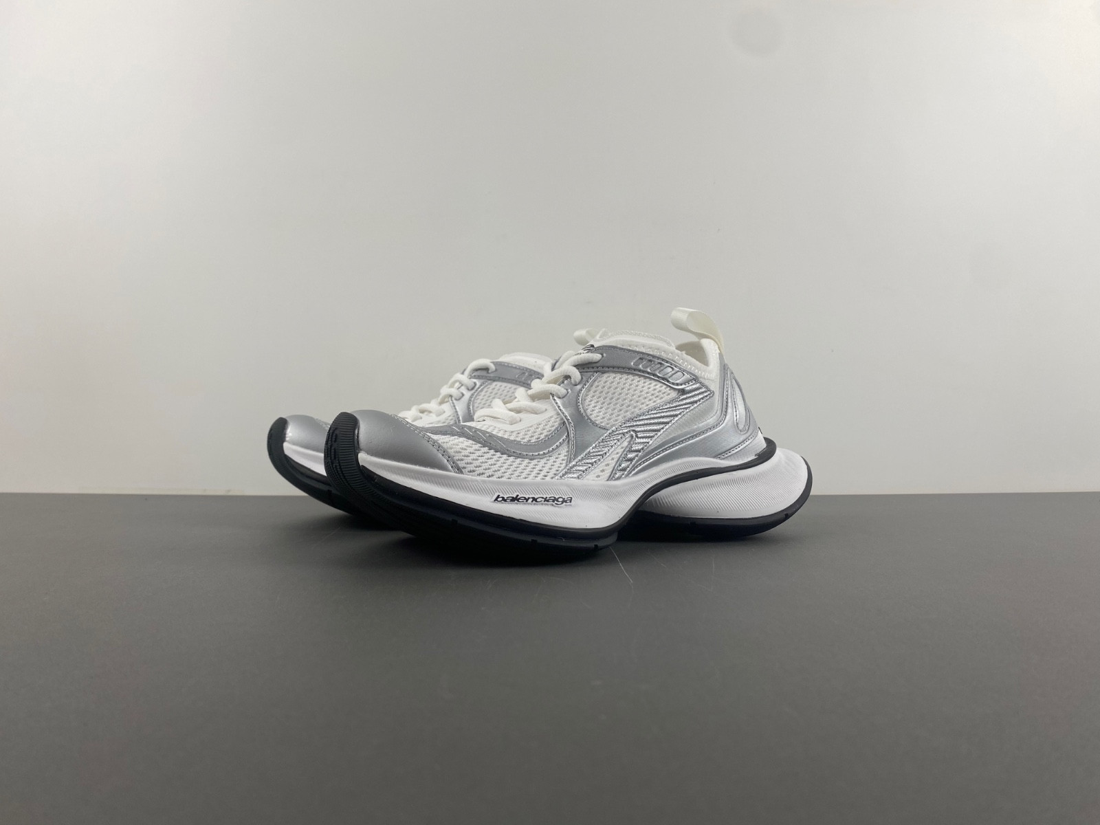 Ba*len*cia*ga women''s circuit sneaker in white/silver