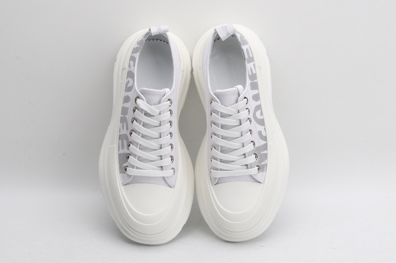alex mcq tread slick lace up in white