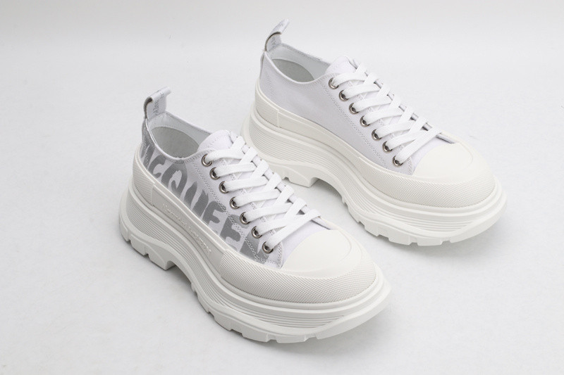 alex mcq tread slick lace up in white