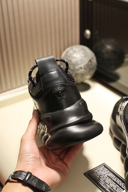 versace chain reaction triple black sneakers
