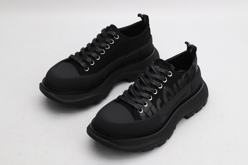 alex mcq tread slick lace up in black